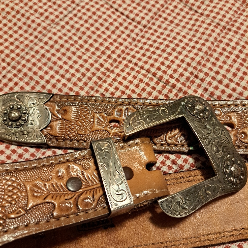30" Leather belt. Lance's Saddle Shop. Ornate silver buckle and tip.
